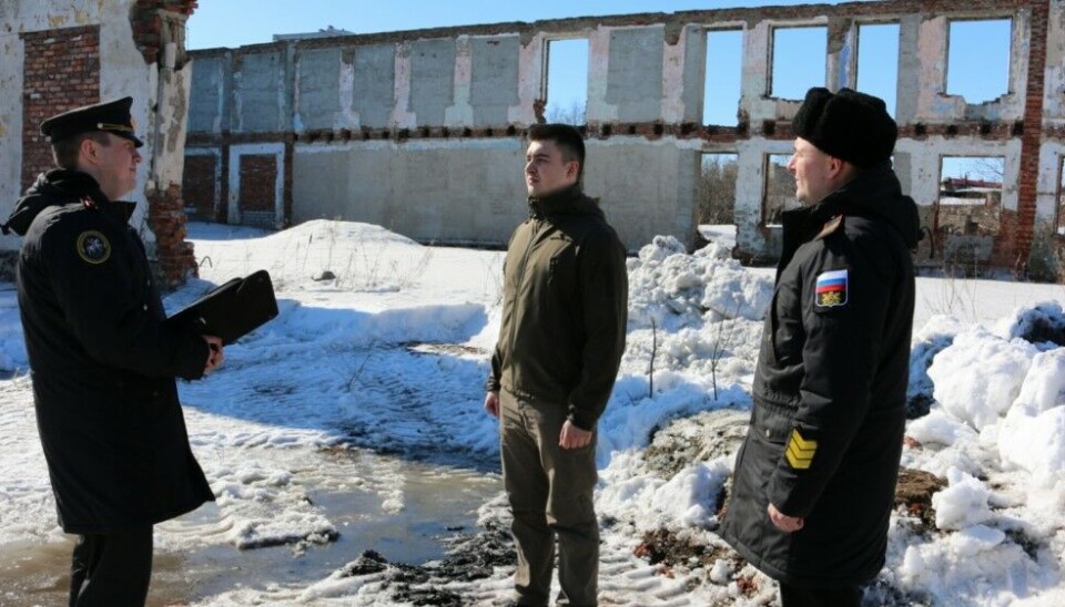 Investigators check ID-papers of young men they find in abandoned buildings. Photo: Military Investigation Department / Northern Fleet