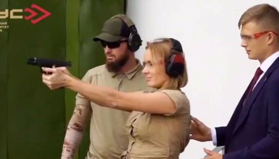 Children’s ombudswoman Maria Lvova-Belova tests weapons at the Spetsnaz University in Chechnya. Photo: screenshot of video at VK