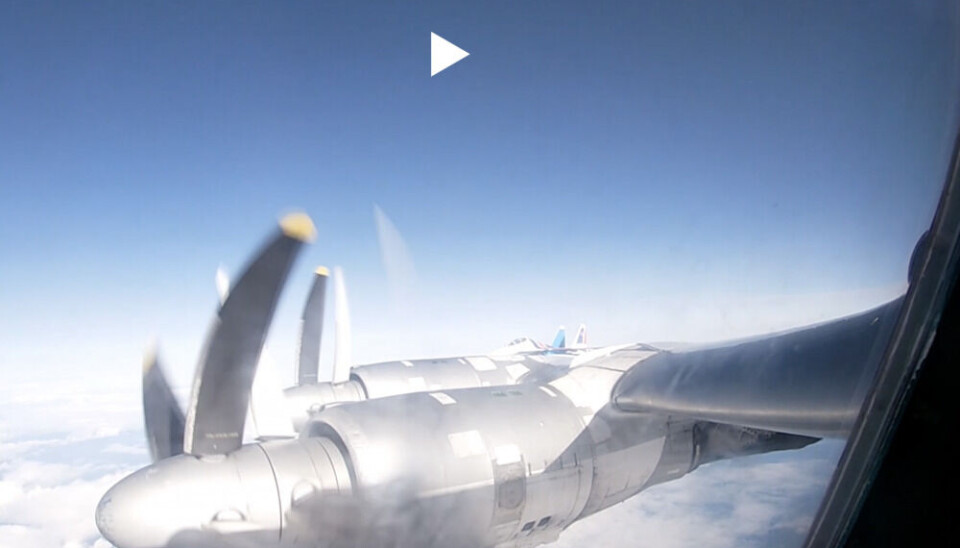 One of the Su-35 (named Flanker-E by NATO) flew wing-by-wing to protect the Tu-95 bombers heading west over the Barents Sea outside northernmost Norway. Screenshot from Defense Ministry video
