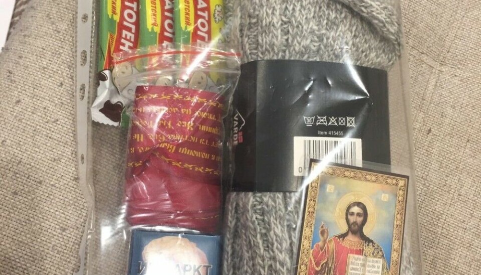 Norway-made VARDE wool socks sold at Sparkjøp in Kirkenes are packed together with cigarettes, an icon, and nutrition bars. Photo from Vkontakte