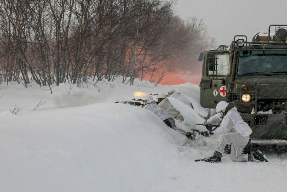CLICK ON GALLERY TO SEE ALL PHOTOS. The Red Cross marked military vehicle did not carry medical personnel, but at least four heavily armed soldiers. Photo: Northern Fleet press service