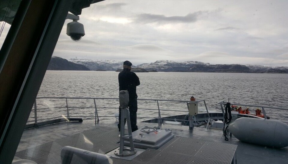 The Norwegian Coast Guard vessel “KV Fram” is patrolling the maritime border areas of the Barents Sea. Here with Grense Jakobselv and Russia in the horizon. Photo: Thomas Nilsen