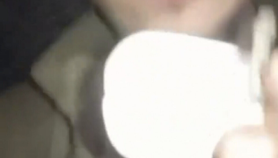 The soldier shows the double ID-tag with his number aimed for identification in case of being killed in battle. Screenshot from video on Telegram