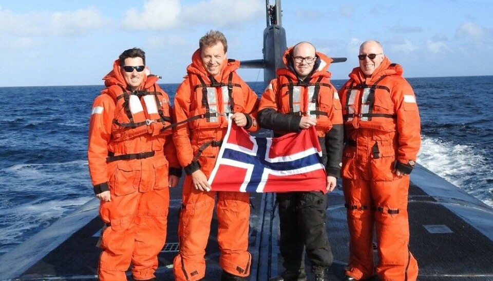 First-of-a-kind, at least in public: A Norwegian flag on top of the ballistic missile launch hatches of a US strategic submarine showing off its nuclear deterrence capabilities outside Norway. Photo: Commander, Submarine Forces