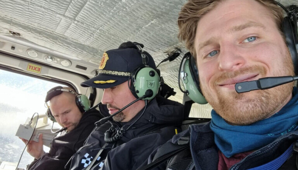 Nikolai Gerrard (right) was earlier this year up in the air above Kirkenes together with Norwegian police with equipment to detect jamming. Photo: Nkom