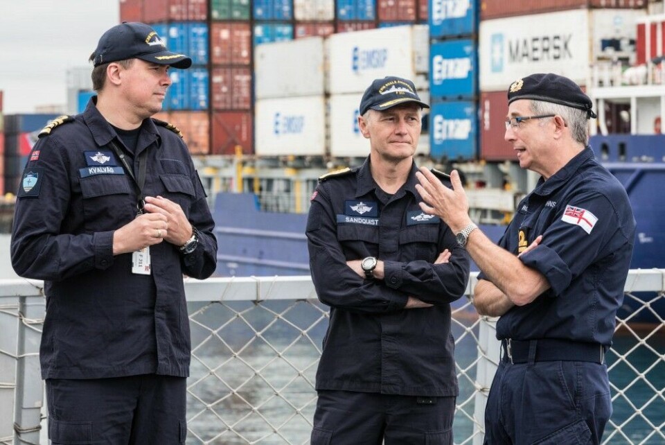 Norwegian Commanding Officer Eivind Kvalvåg and Commodore Ole Morten Sandquist prepare for action with a British colleague. Photo: VK Jakob Østheim, Forsvaret