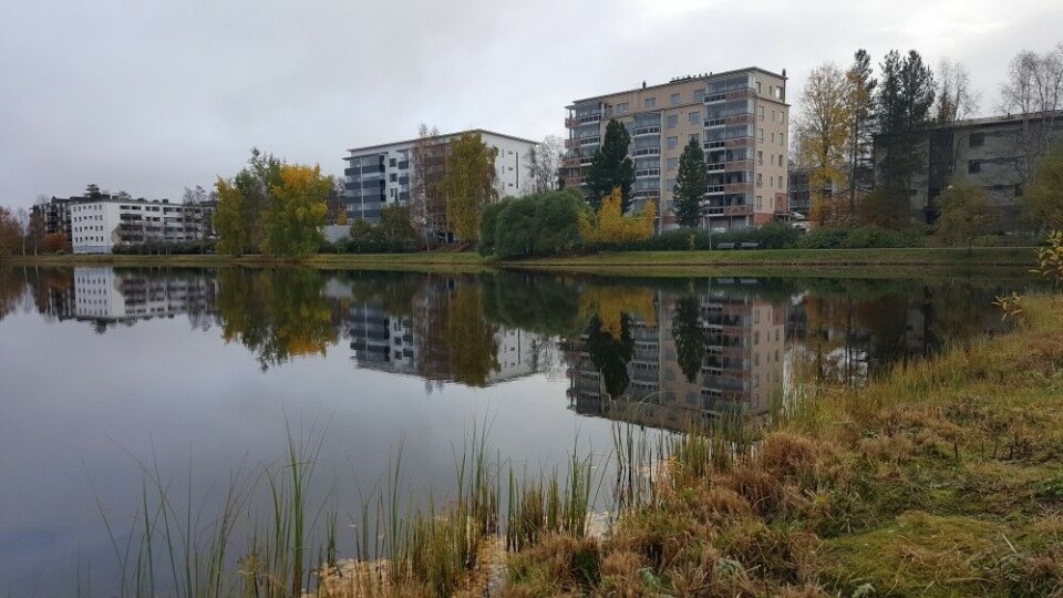 Apartment blocks mirroring in Lake Kirkkolampi in Rovaniemi. Photo: Thomas Nilsen