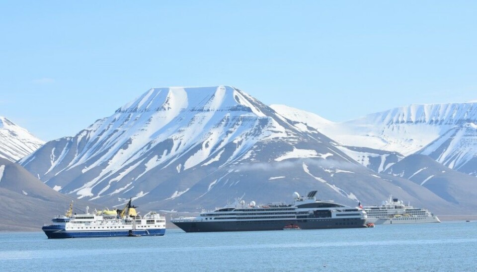 Three expedition cruise ships at anchor in Adventfjorden outside Longyearbyen. Photo: Thomas Nilsen