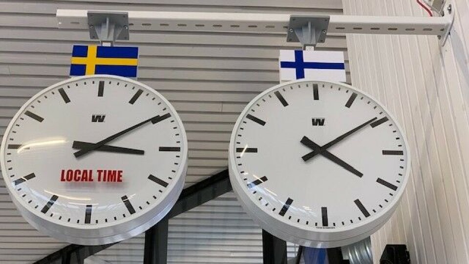 Two clocks at the Tornio-Haparanda Travel Center in Haparanda, Sweden, near the border with Finland. Photo: Eilís Quinn/Eye on the Arctic