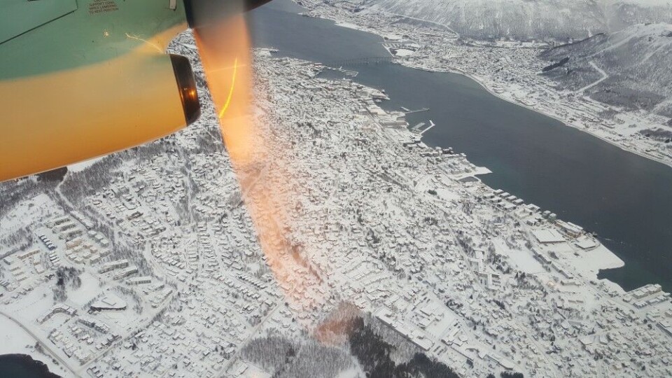 Regional airliner Widerøe in the skies over Tromsø, northern Norway. Photo: Thomas Nilsen