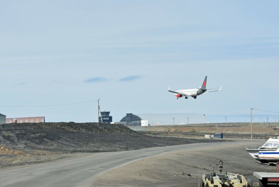 A charter plane on final approach to Svalbard airport Longyear.