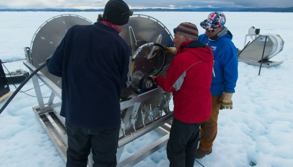 Drill-team members start assembling the hose onto its spool. L-R David Hildes, Alun Hubbard, Hayden Pearson. Photo: Henry Patton