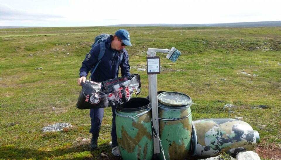 As one of the management actions to support the arctic fox population, dog pellets are provided through specially designed feeding stations. The entrances are dimensioned to let in arctic foxes, but not the larger red foxes. The feeding stations are filled regularly by the State Nature Surveillance. Photo: Dorothee Ehrich / UiT The Arctic University of Norway