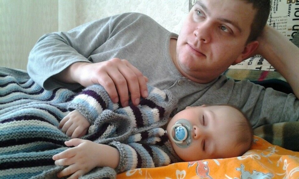 HOME IN ODESSA: Dmitry Kravchenko at home with his son Timofei (1)