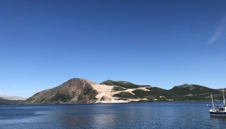 A faint hum from the machines and trucks at the mine can be heard across the fjord. Photo: Hannah Thulé