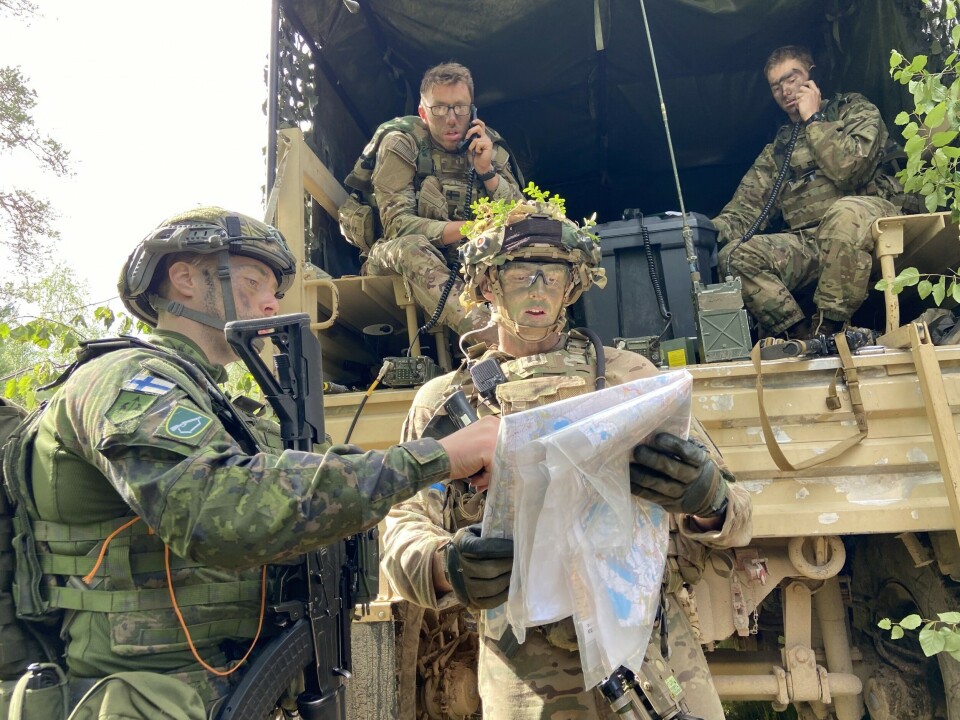 U.S. and Finnish soldiers work side-by-side reading the terrain as their forces make ready for another counter-attack in the wilderness battlefield north of the Arctic Circle. Photo: Thomas Nilsen