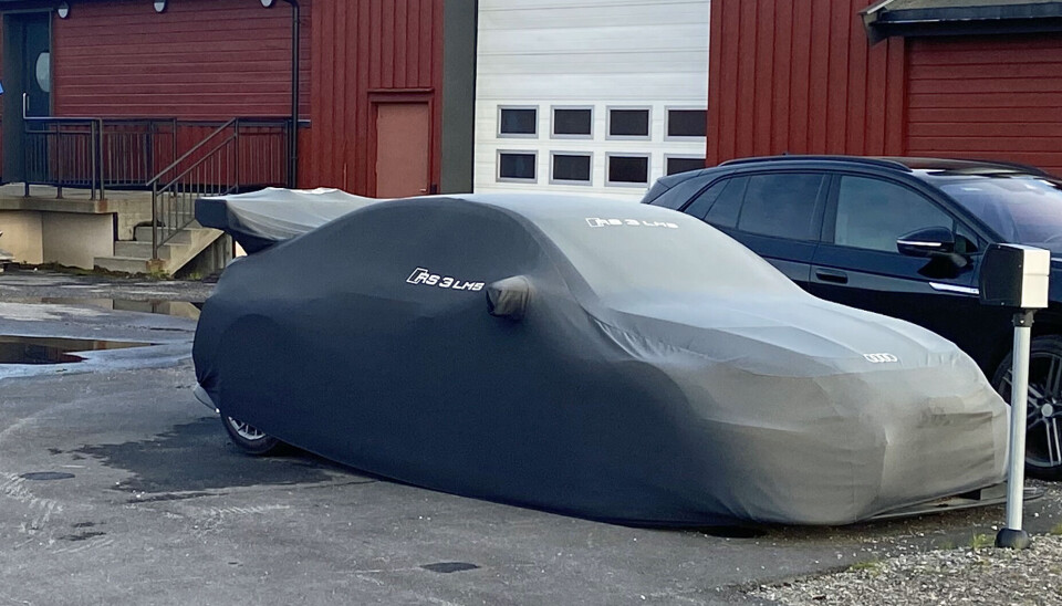 Confiscated or not: This covered expensive Audi racing-car is parked outside the garage of Norwegian customs at Storskog.
