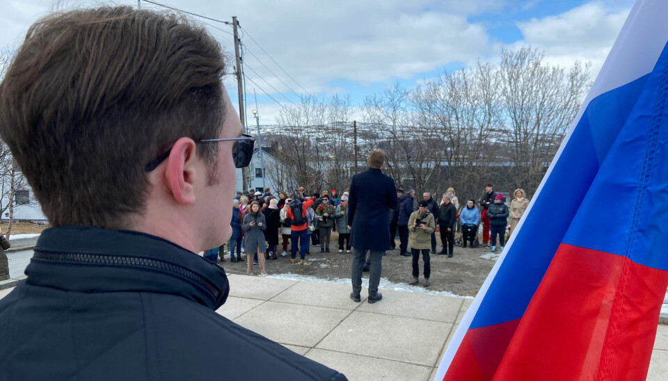 Nikolai Ruzaev holding the Russian flag during the May 9th ceremony at the war memorial in Kirkenes. Nikolay Ruzaev