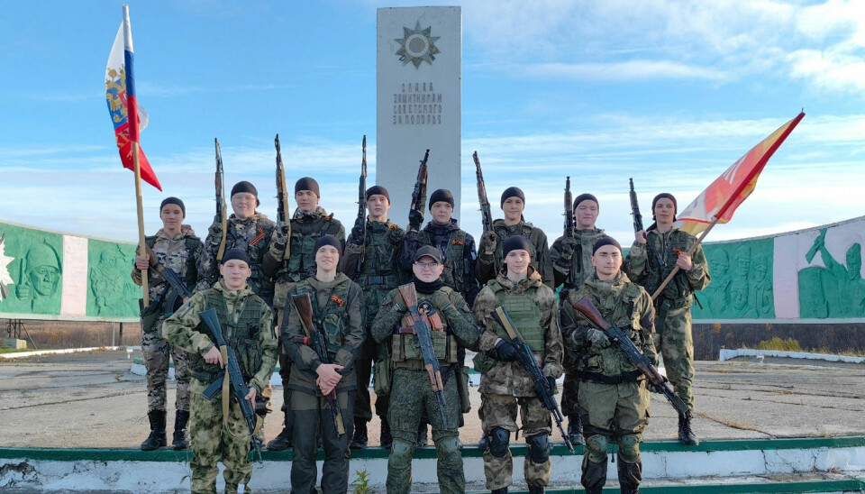 Local teenagers from militant youth organisation Kolchuga pose in front of one of the many war memorials in Pechenga as part
of the celebration of the 80th anniversary of the Soviet counter-attack on German troops in October 1944.