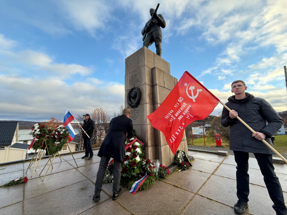 Nikolai Konygin places Russia's wreaths in the centre after the Norwegian organizers had removed their three wreaths to the sideline at the war memorial in Kirkenes.
