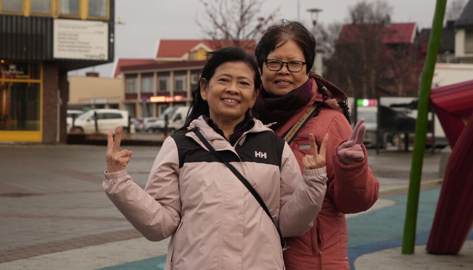 Tourists from Singapore Yee and Sap in Kirkenes - they had a snowmobile tour canceled.