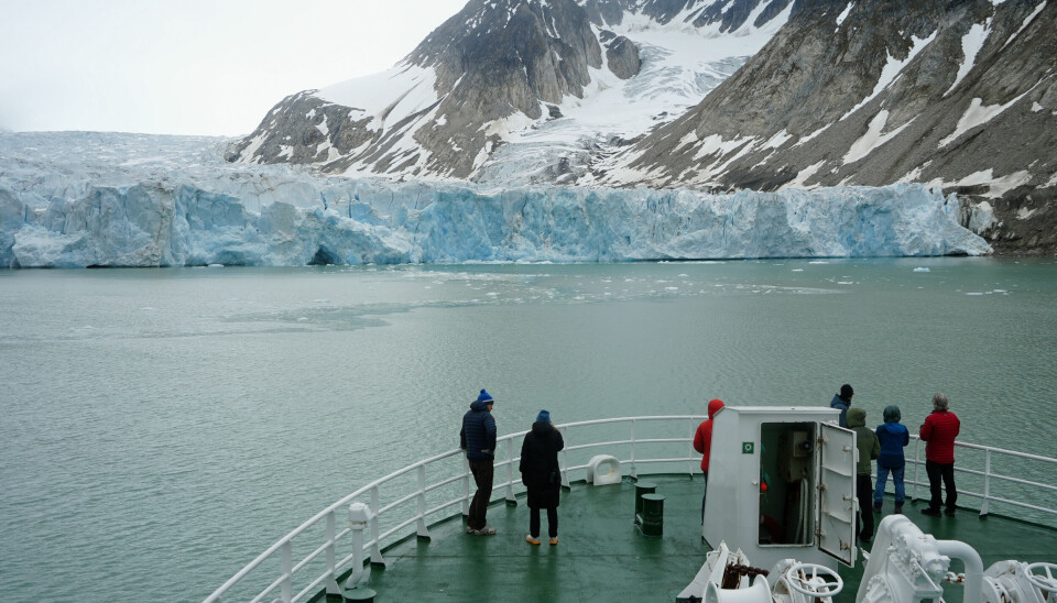 Melting glacier calving into the sea at Svalbard.