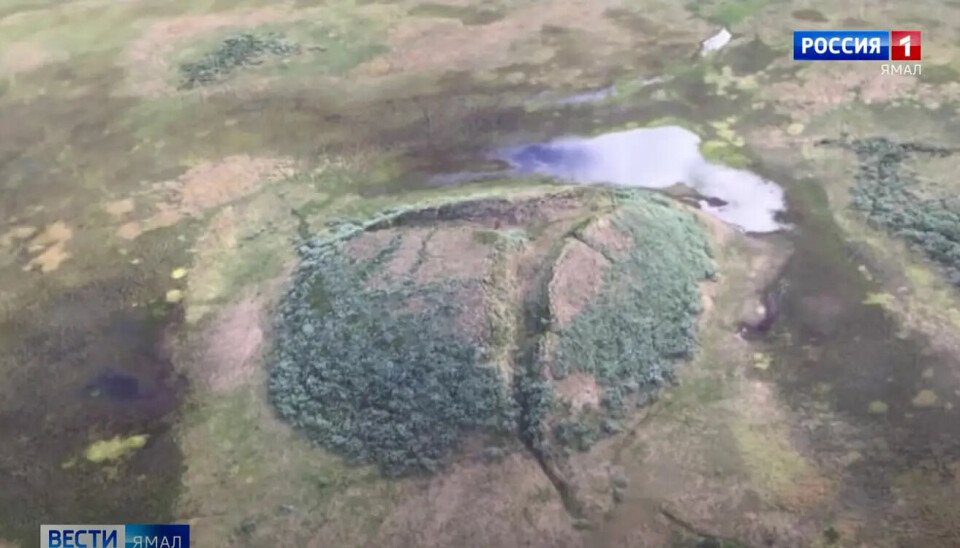 A dome with gas waiting to burst and create a crater on land.