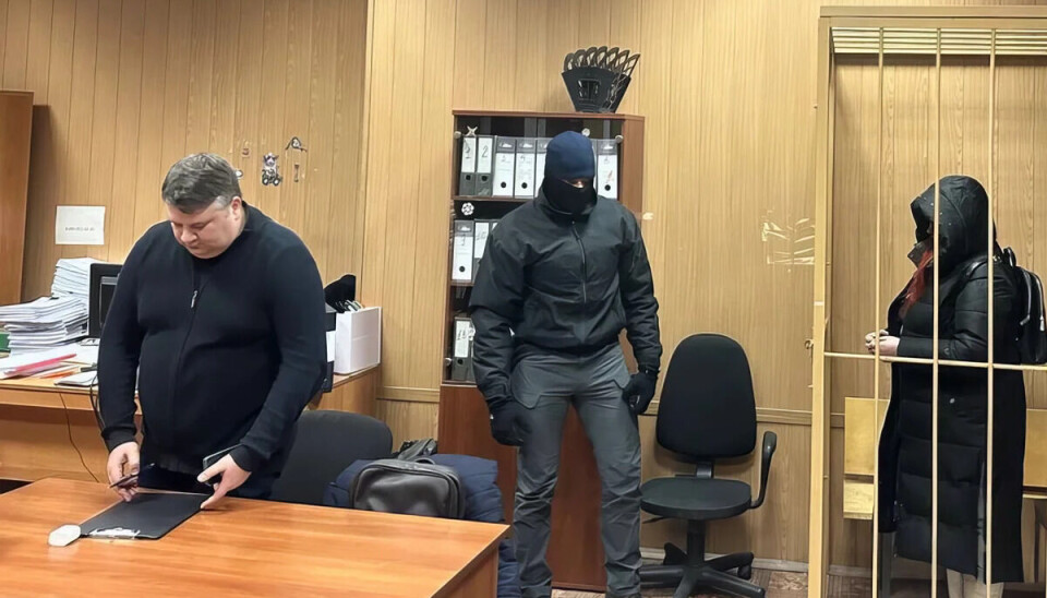 Nika Novak behind bars during a trial in Moscow in December 2023.