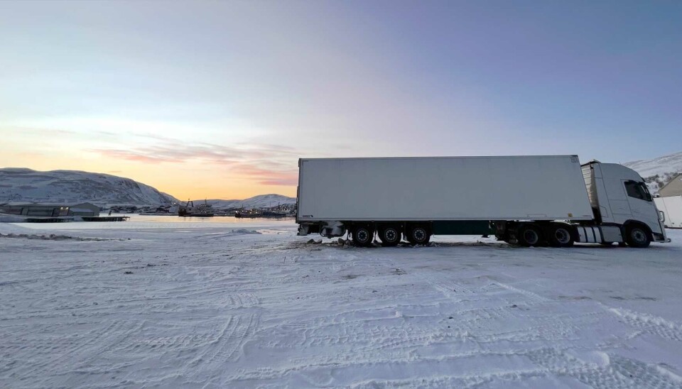 Truck waiting to load fish in the north Norwegian port of Båtsfjord.