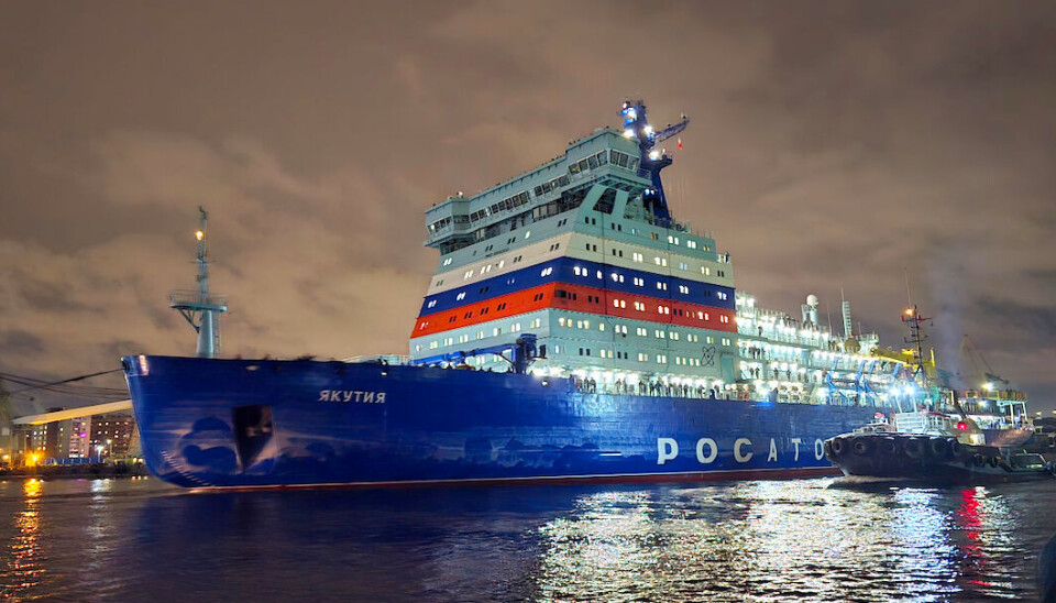 The Yakutiya icebreaker is escorted out the Neva River from the yard in St. Petersburg.