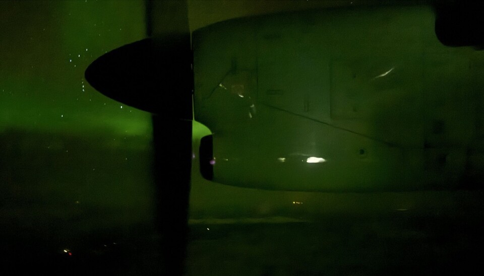 Aurora borealis seen from the Widerøe plane in northern Norway