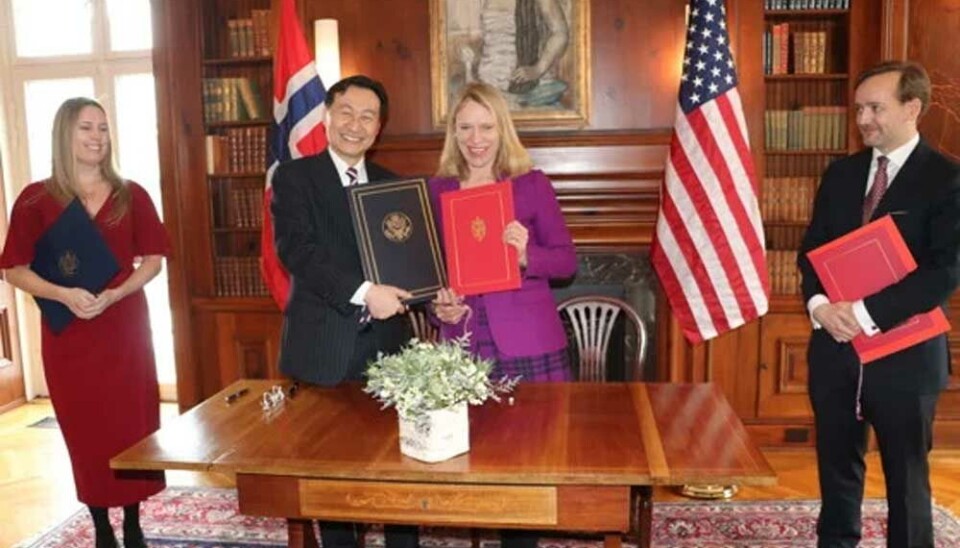 U.S. State Department Assistant Secretary for International Security and Nonproliferation C.S. Eliot Kang and Norwegian Ambassador to the United States Anniken Huitfeldt sign TSA in Washington.