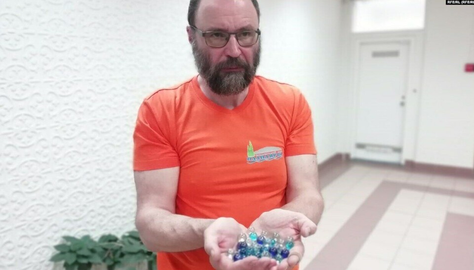 Filenko brought 324 glass marbles - symbols of killed Ukrainian children - to the courtroom.