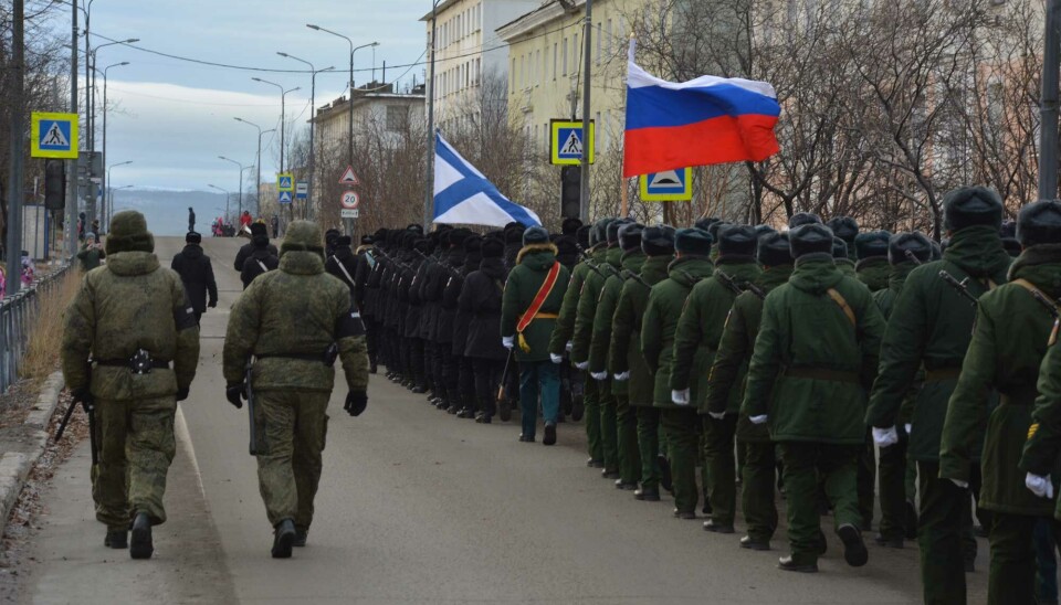 Soldiers from the 200th Motorised Rifle Brigade and the 61st Naval Infantry Brigade marching in the border town of Nikel before the full-scale war.