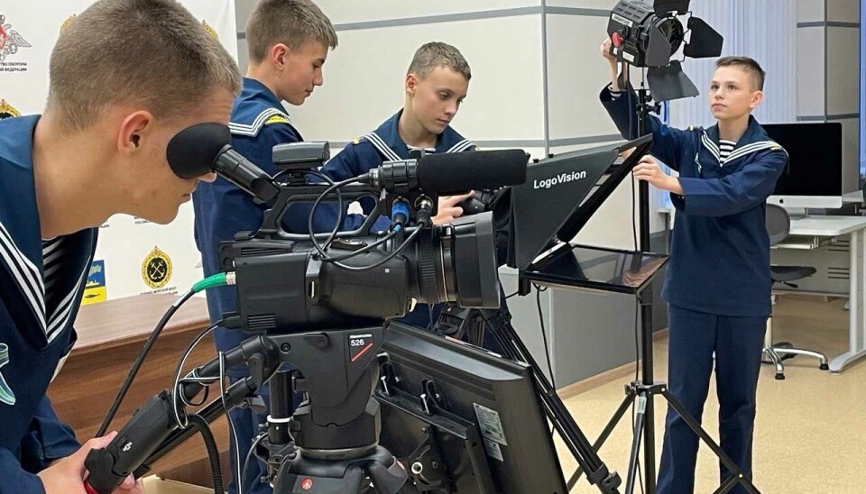 Students at the Murmansk Cadet School learn to handle a camera.