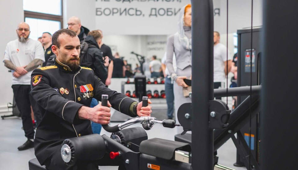 Valery Yakupov, leader of the newly established Organisation for veterans from the special military operation, tries equipment at the new spiritual sport centre.
