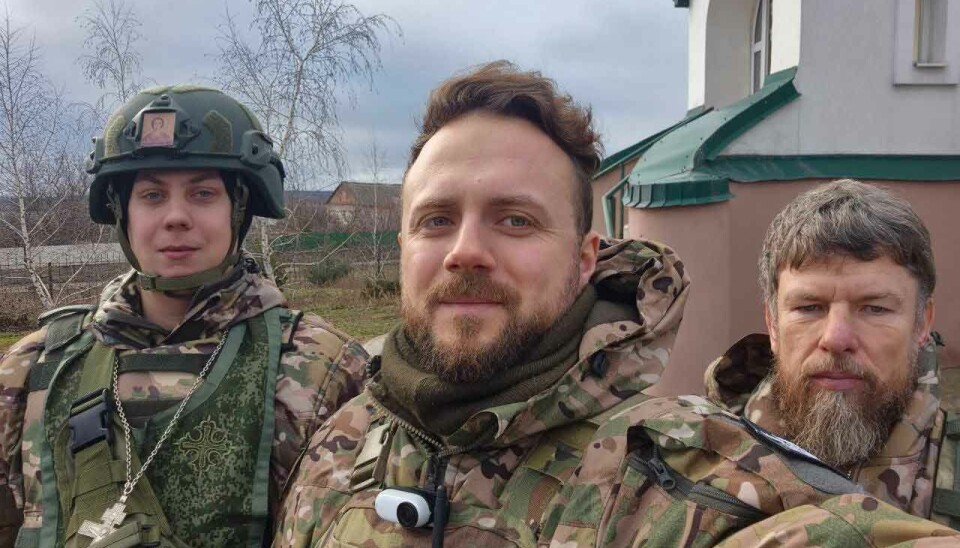 Andrei Afanasev (center) is war propagandist for Russian Orthodox media and co-founder of the Russkaya Obshchina.