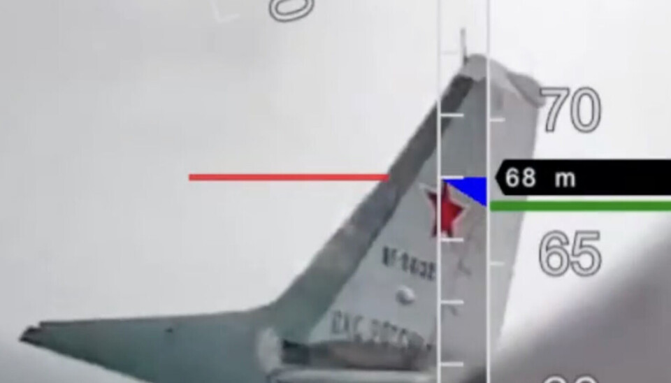 The tail number RF-4132 is visible seconds before one of the Ukrainian drones blow the bomber up while parked on the apron at Olenya air base on June 1.