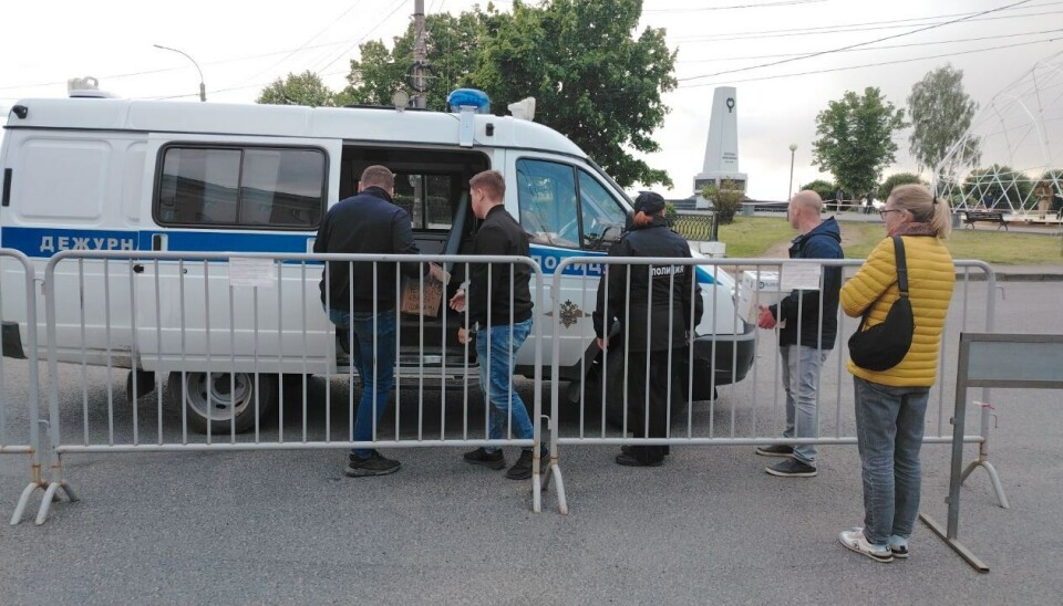 The police drove away with the confiscated books.