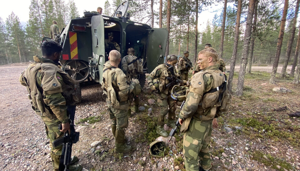 A Finnish armored vehicle opens the doors for transporting Norwegian army soldiers from Finnmark during an exercise at Rovajärvi artillery practice range near Kemijärvi in northern Finland.