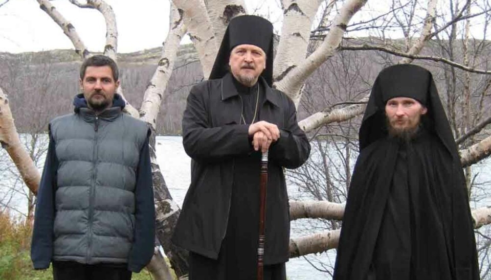 Monk Dosifey (right) together with his helper Timofey (left) and Metropolitan Mitrofan in 2016.