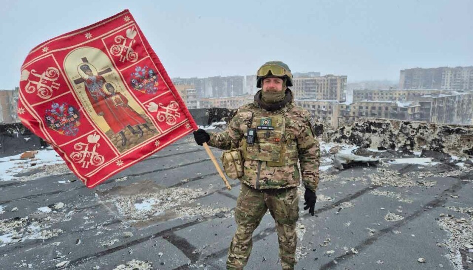 Imperial flag on rooftop in Vuhledar, a Ukrainian city that was bombed to rubbles by Russian forces.