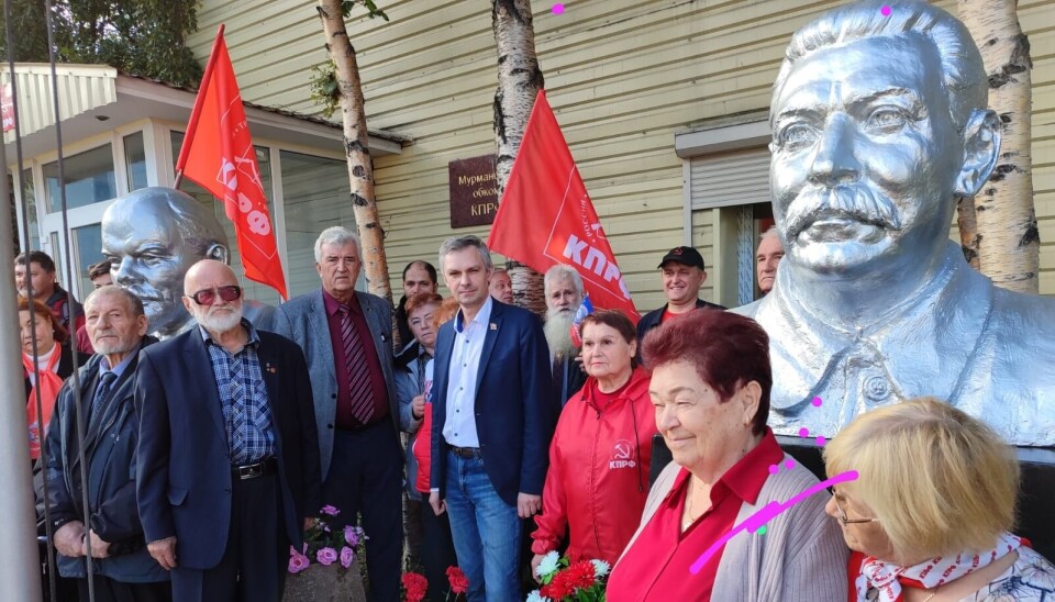 Photo-session for local members of the Communist Party in Murmansk in front of the new bust of Josef Stalin which was unveiled on Sunday, August 31.