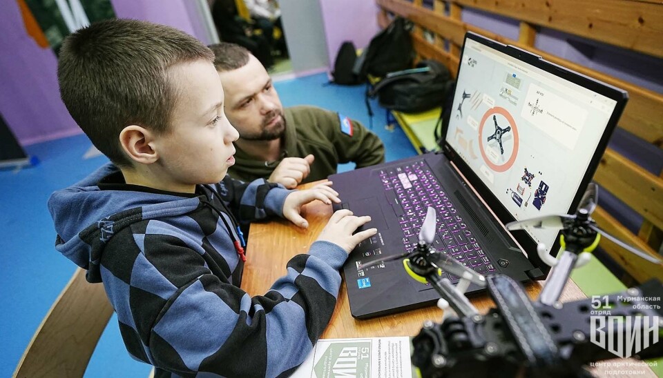 Kids learning to operate drones at the VOIN Centre in Murmansk.