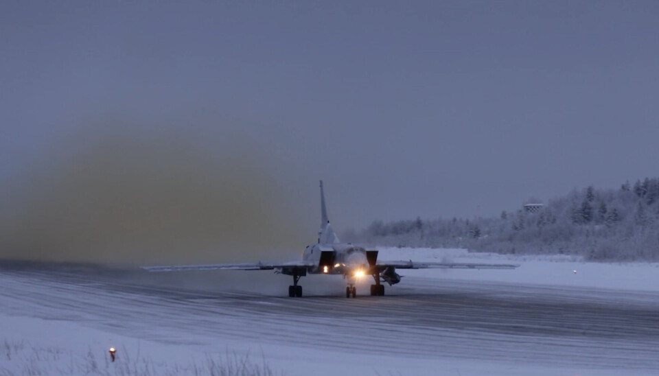 One of the Tu-22M3 bombers had a cruise missile attached under the wing when taking off from the Olenya Air Base north of the Arctic Circle.
