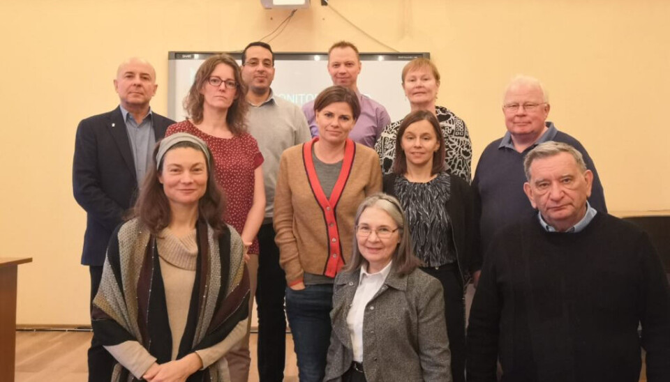 Aleksei Dudarev (left) together with partners from AMAP, among them Rolf Rødven (centre, back).