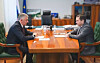 Andrey Chibis and Lavna CEO Stanislav Multakh discussed the development of a new railcar tipping complex.
